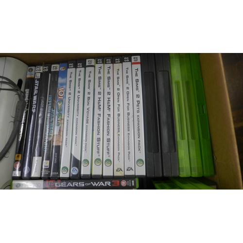 2193 - Two XBox 360 consoles and a quantity of assorted games