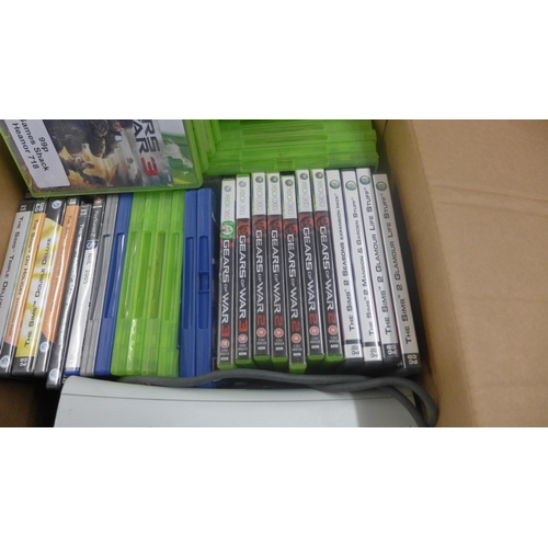 2194 - XBox 360 consoles and a quantity of assorted games