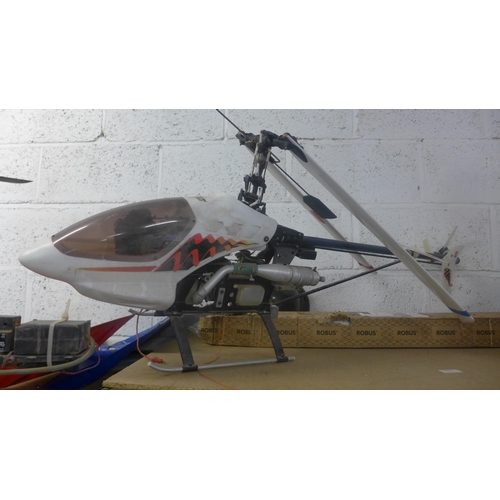 2195 - Two 1.2m two-stroke remote control helicopters, ideal project items