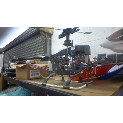 2195 - Two 1.2m two-stroke remote control helicopters, ideal project items