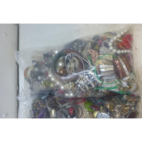 2244 - Two bags of approx 8kg mixed costume jewellery