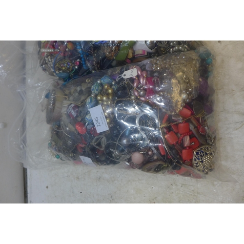 2245 - Two bags of approx 8kg mixed costume jewellery