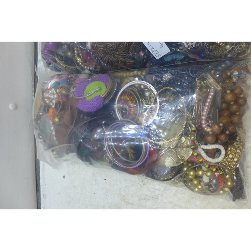 2246 - Two bags of approx 8kg mixed costume jewellery