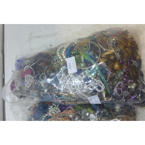 2247 - Two bags of approx 8kg mixed costume jewellery