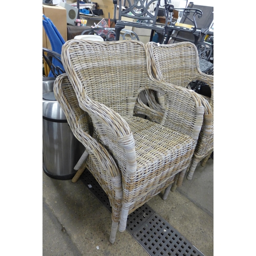 2391 - 4 stacking Wicker garden chairs