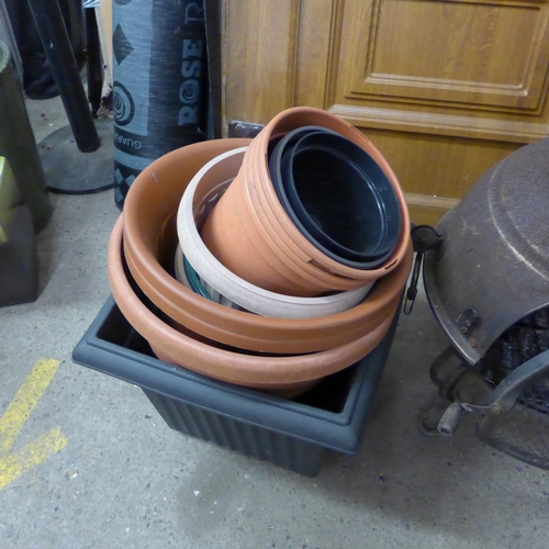 2419 - Cast iron chimenea/garden stove and approx 15 vinyl planters