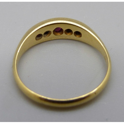 1121 - An 18ct gold, ruby and diamond ring, 3.4g, O