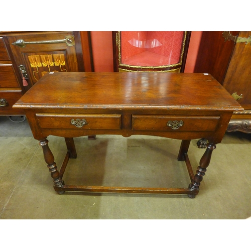 150 - A George III style Ipswich oak dresser