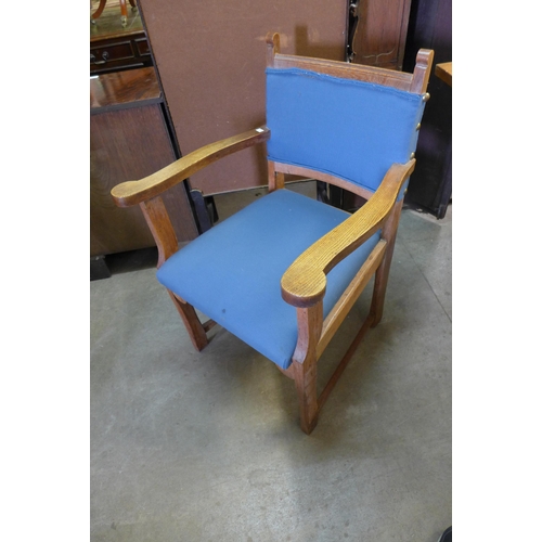 197 - An Arts and Crafts oak refectory table and six chairs, manner of Heals