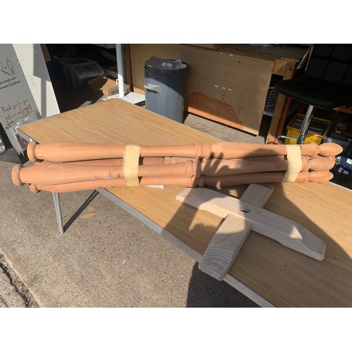 2274 - Two bags and a bundle of assorted solid timber spindles and carved wood legs