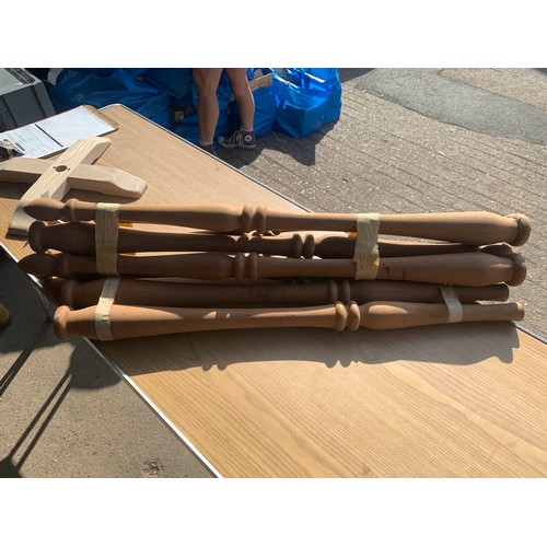 2274 - Two bags and a bundle of assorted solid timber spindles and carved wood legs