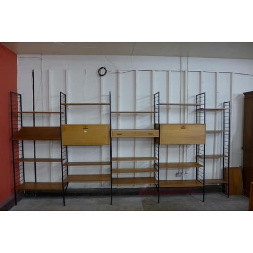 10 - A Staples teak modular five bay Ladderax room divider