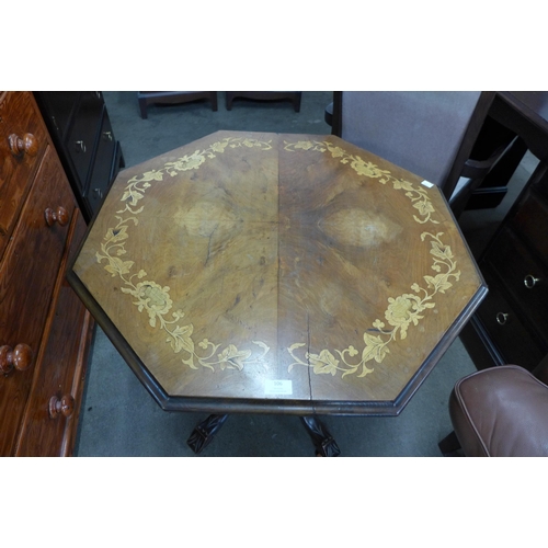 106 - A Victorian inlaid walnut octagonal centre table