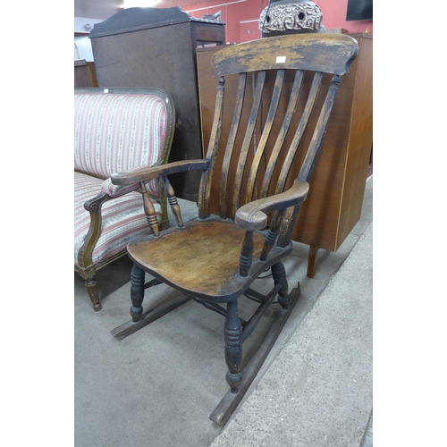 118 - A Victorian elm and beech farmhouse rocking chair