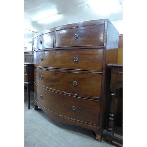 149 - A George III inlaid mahogany bow front chest of drawers