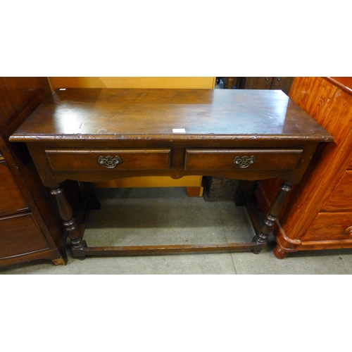 150 - A George III style Ipswich oak dresser