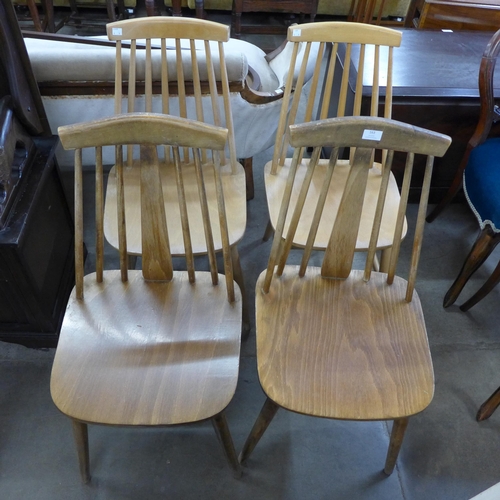 163 - A set of four beech kitchen chairs