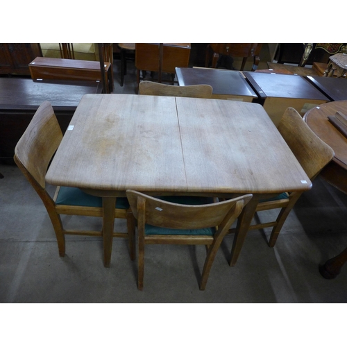 166 - A Nathan walnut six piece dining suite