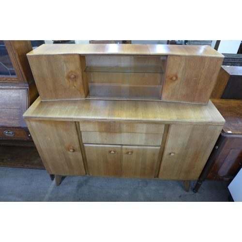 166 - A Nathan walnut six piece dining suite