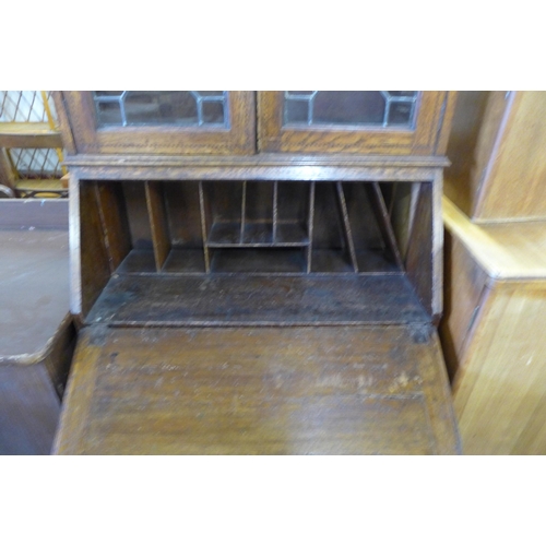 172 - An Edward VII inlaid oak bureau bookcase