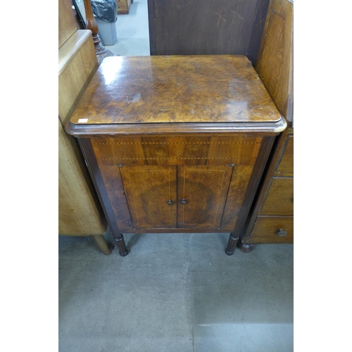 173 - An inlaid walnut gramophone cabinet and an oak bureau