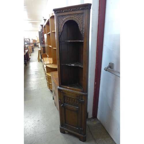 190 - A 17th Century style carved Ipswich oak corner cabinet