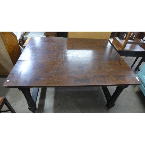 198 - A Victorian painted beech kitchen table with an elm top