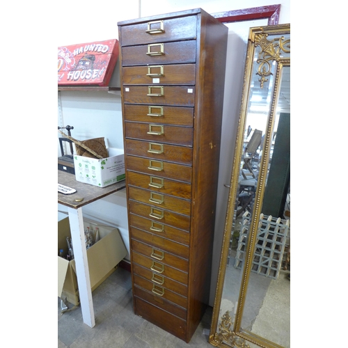 206 - An oak eighteen drawer filing cabinet