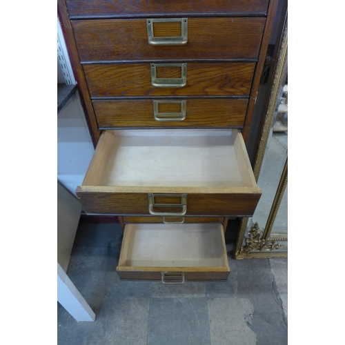 206 - An oak eighteen drawer filing cabinet