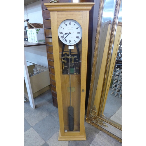 207 - An oak cased synchronome master clock