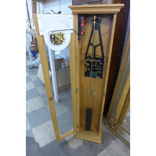 207 - An oak cased synchronome master clock