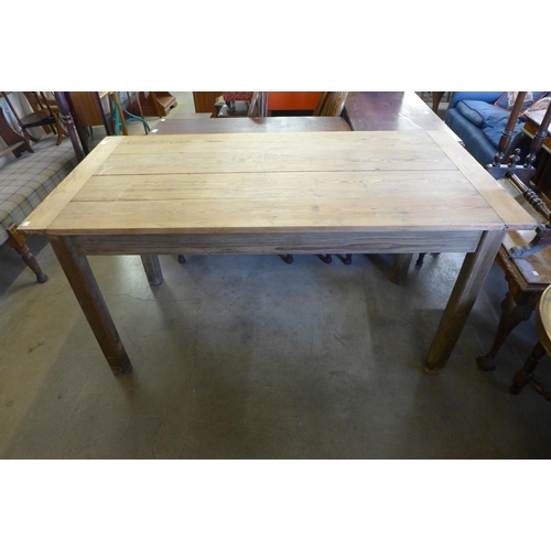 226 - A pine and beech kitchen table