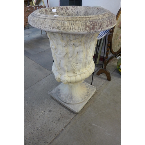 231 - A large Grecian style concrete campana shaped garden urn, 90cms h