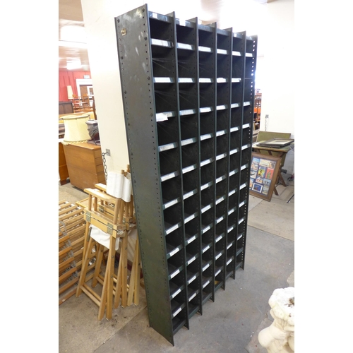 232a - A large industrial green steel pigeonhole cabinet