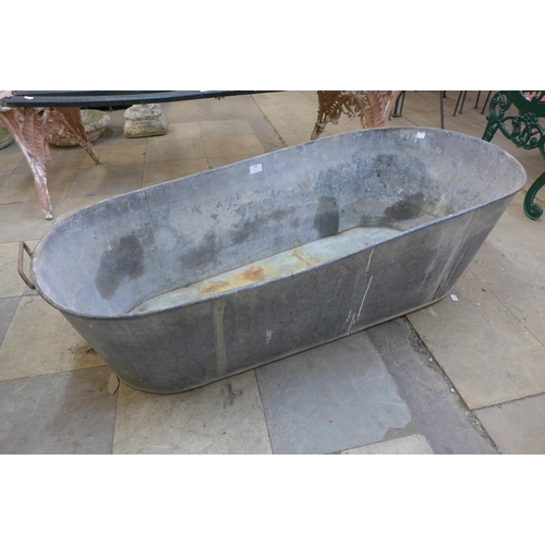 238 - A galvanised slipper bath