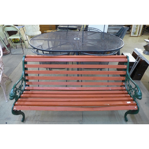 243 - A cast iron ended garden bench