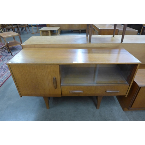 26 - A teak sideboard