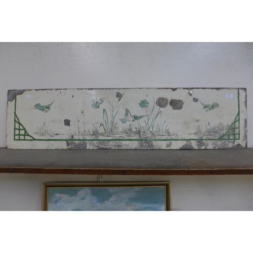 273 - An early 20th Century enamelled splashback panel