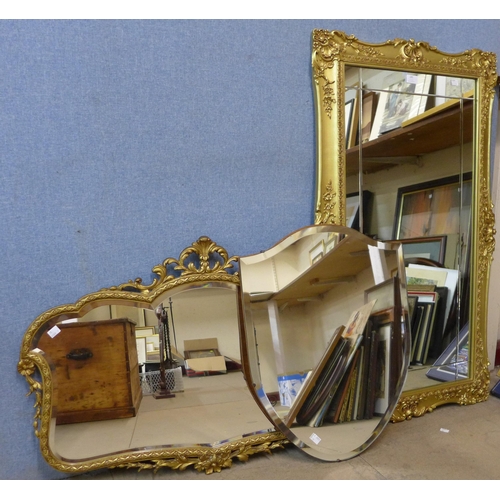 285 - Two gilt framed mirrors and another