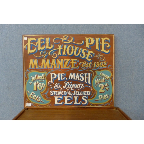 286 - A painted wooden M. Manze, Eel and Pie Shop sign