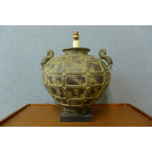 288 - An oriental metal table lamp