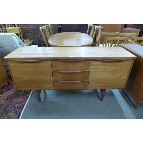 36 - A teak sideboard