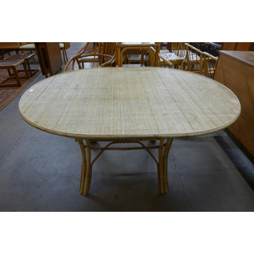 40 - A bamboo and rattan oval dining table