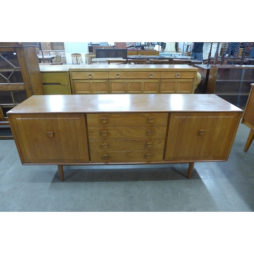 63 - An Ensign teak and elm sideboard, by Bristow & Townsend