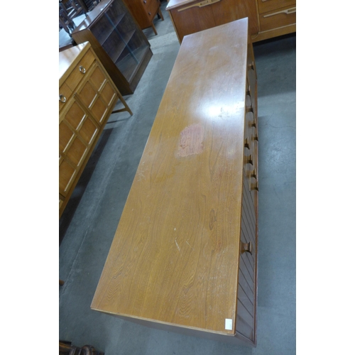 63 - An Ensign teak and elm sideboard, by Bristow & Townsend