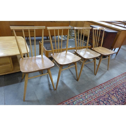 70 - A set of four Ercol Blonde elm and beech 608 model dining chairs