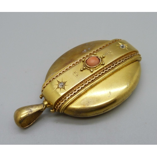 1004 - A large Victorian coral and diamond set locket, (tests as high carat gold), 37.1g, 39mm wide