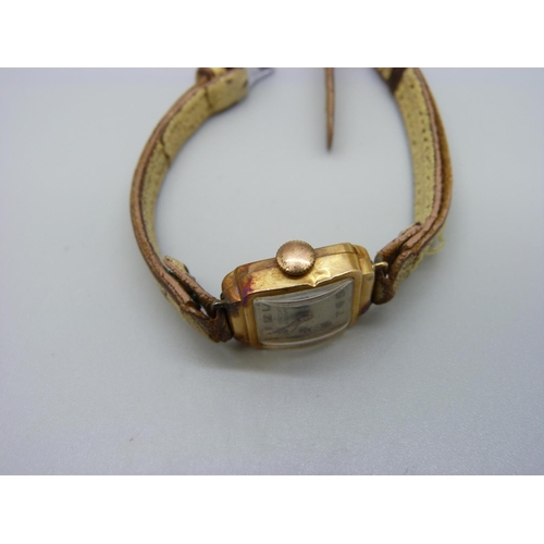 1010 - A lady's 18ct gold cased wristwatch