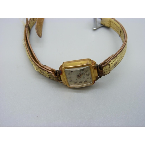 1010 - A lady's 18ct gold cased wristwatch