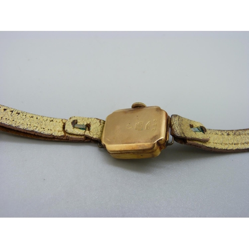 1010 - A lady's 18ct gold cased wristwatch